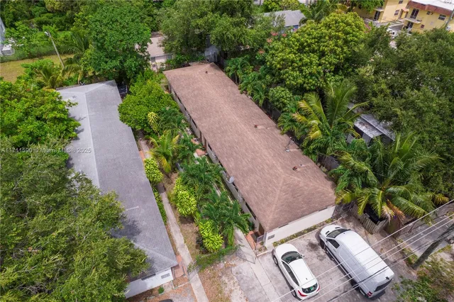 an aerial view of a house with garden