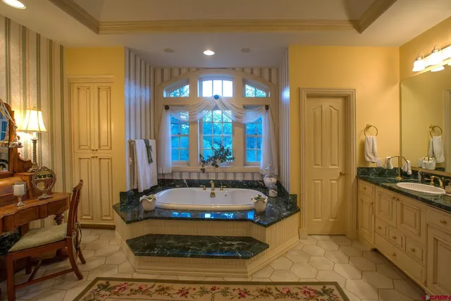 a view of a livingroom with furniture and windows