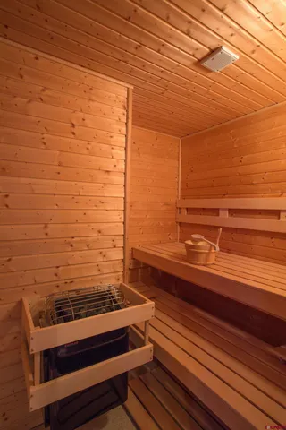 a view of a livingroom with furniture and a chandelier