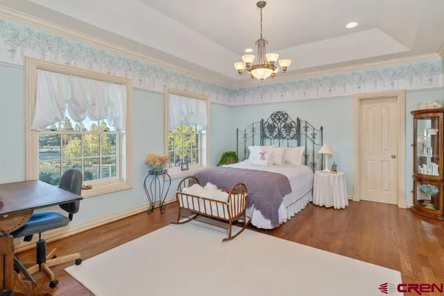 a view of a workspace with furniture