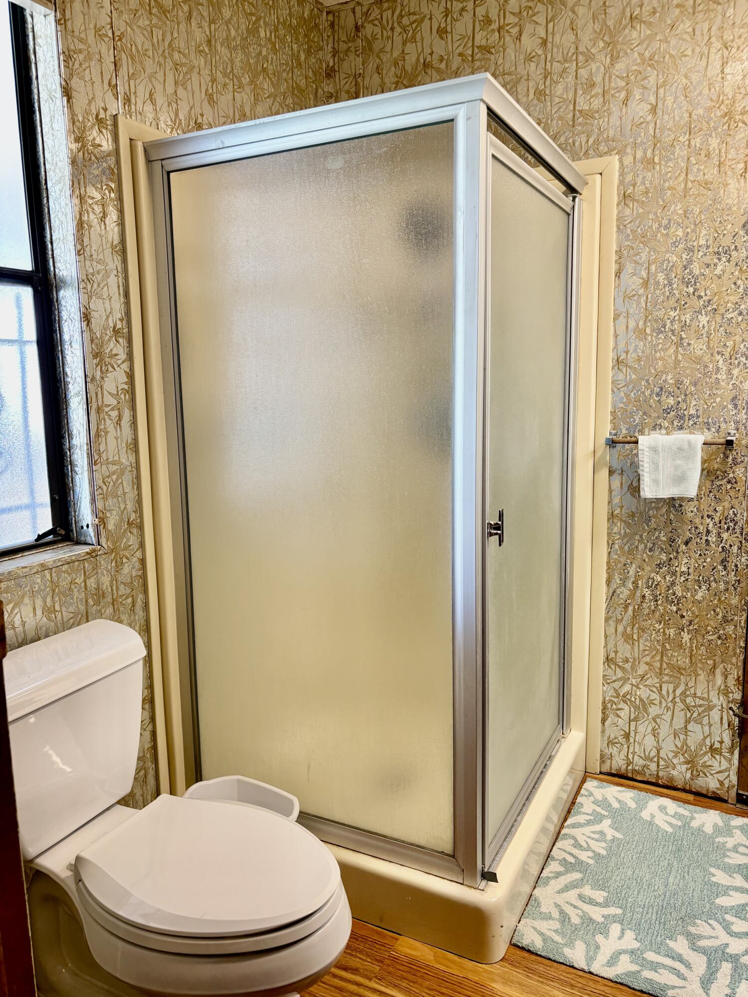 74711 Dillon Road, Unit 387 Desert Hot Springs, CA 92241 - Photo 23 of 50 a bathroom with a toilet and a shower