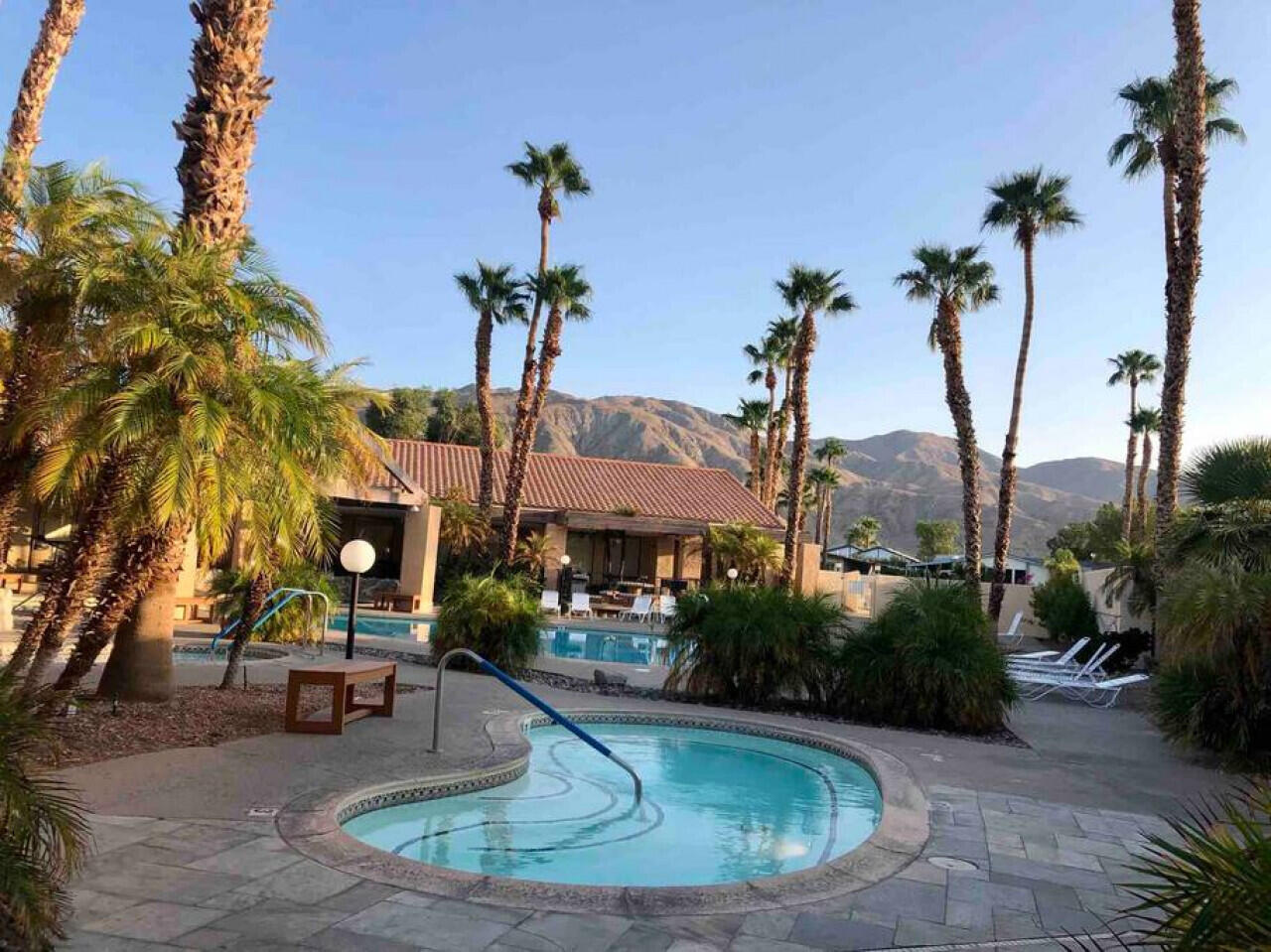 74711 Dillon Road, Unit 387 Desert Hot Springs, CA 92241 - Photo 37 of 50 a view of a house with a swimming pool