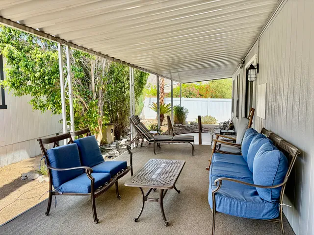 a outdoor living space with furniture and garden view