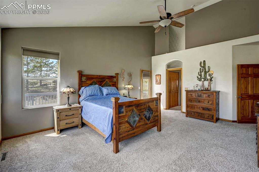 5910 McCart Ranch Circle Elizabeth, CO 80107 - Photo 12 of 50 a bed room with a bed and a chair