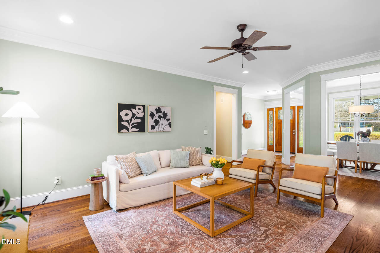 300 Long Meadows Road Chapel Hill, NC 27516 - Photo 11 of 42 a living room with furniture and a rug