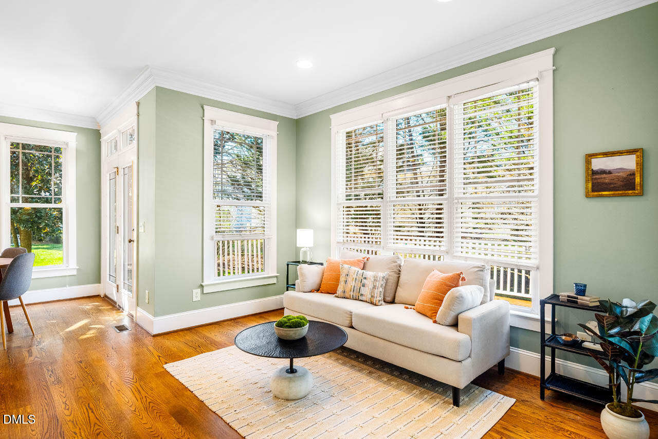 300 Long Meadows Road Chapel Hill, NC 27516 - Photo 20 of 42 a living room with furniture and a large window