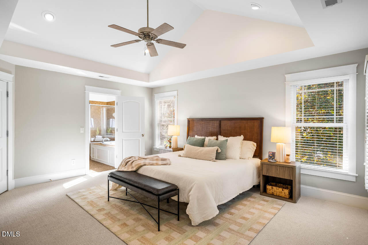 300 Long Meadows Road Chapel Hill, NC 27516 - Photo 22 of 42 a bedroom with a bed and a window