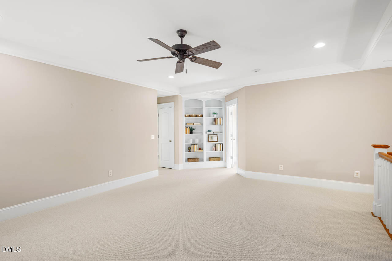 300 Long Meadows Road Chapel Hill, NC 27516 - Photo 25 of 42 a view of an empty room with a window