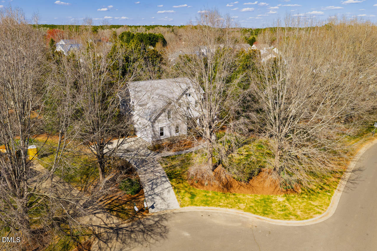 300 Long Meadows Road Chapel Hill, NC 27516 - Photo 2 of 42 a view of a lake with a mountain in the background
