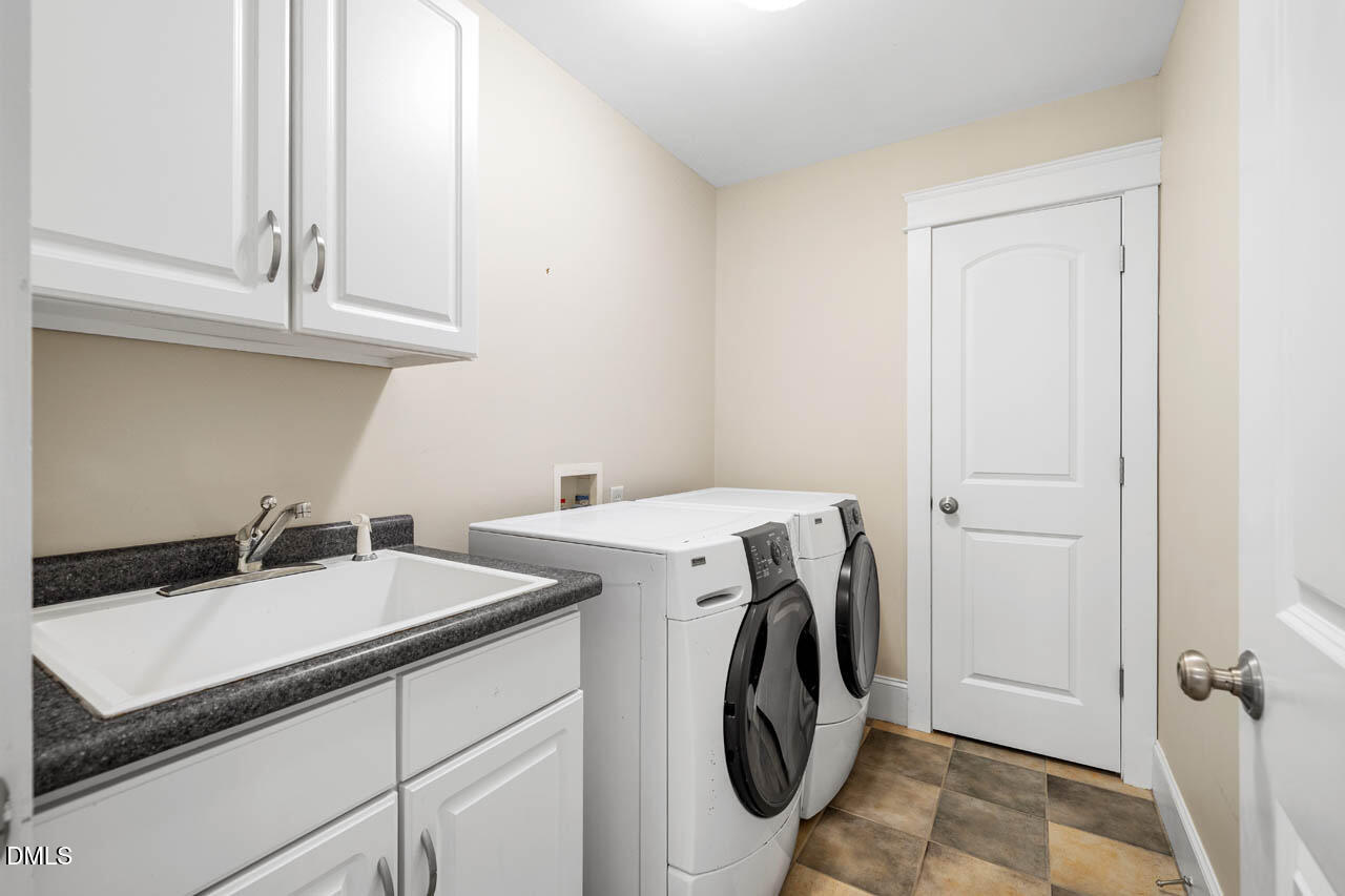 300 Long Meadows Road Chapel Hill, NC 27516 - Photo 31 of 42 a utility room with dryer and washer