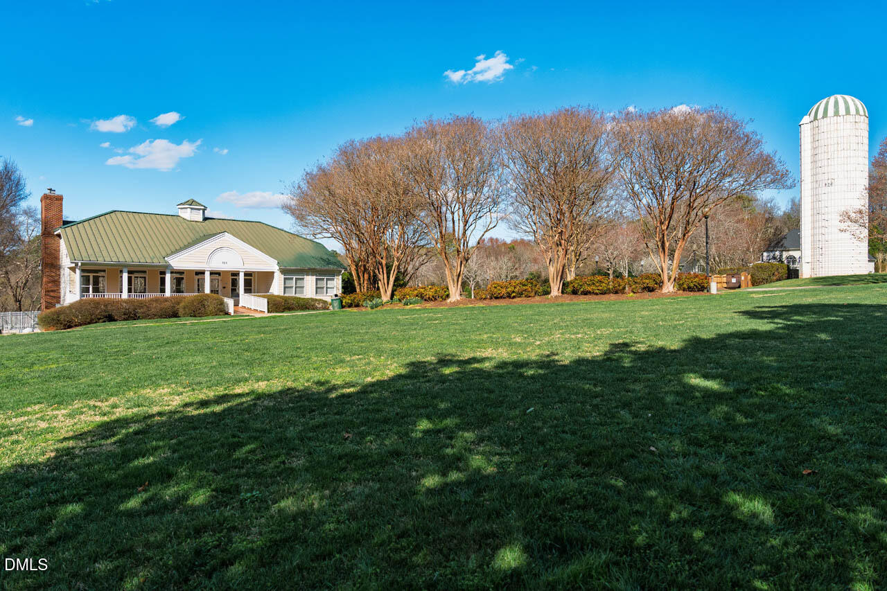 300 Long Meadows Road Chapel Hill, NC 27516 - Photo 36 of 42 a front view of a house with garden