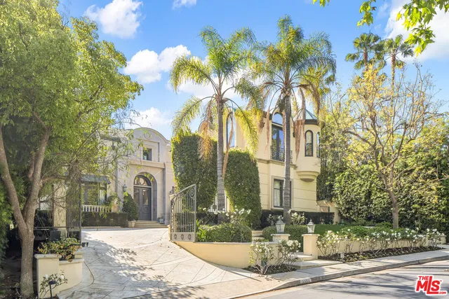 a view of a building with a tree