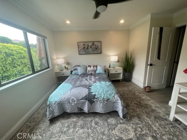 28033 Ridgecove Court North Rancho Palos Verdes, CA 90275 - Photo 2 of 11 a spacious bedroom with a bed and wooden floor