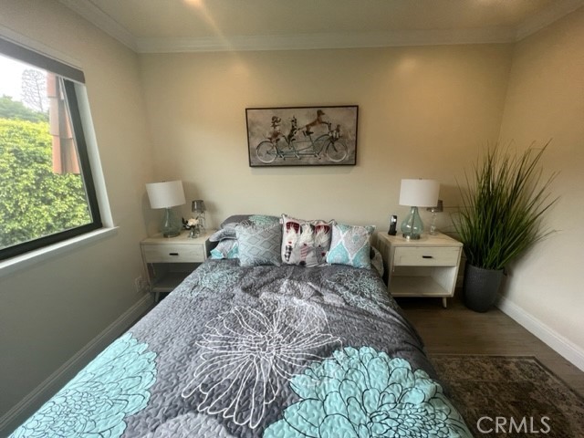 28033 Ridgecove Court North Rancho Palos Verdes, CA 90275 - Photo 4 of 11 a bedroom with a large bed and a window