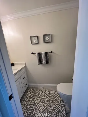 a bathroom with a toilet and a sink