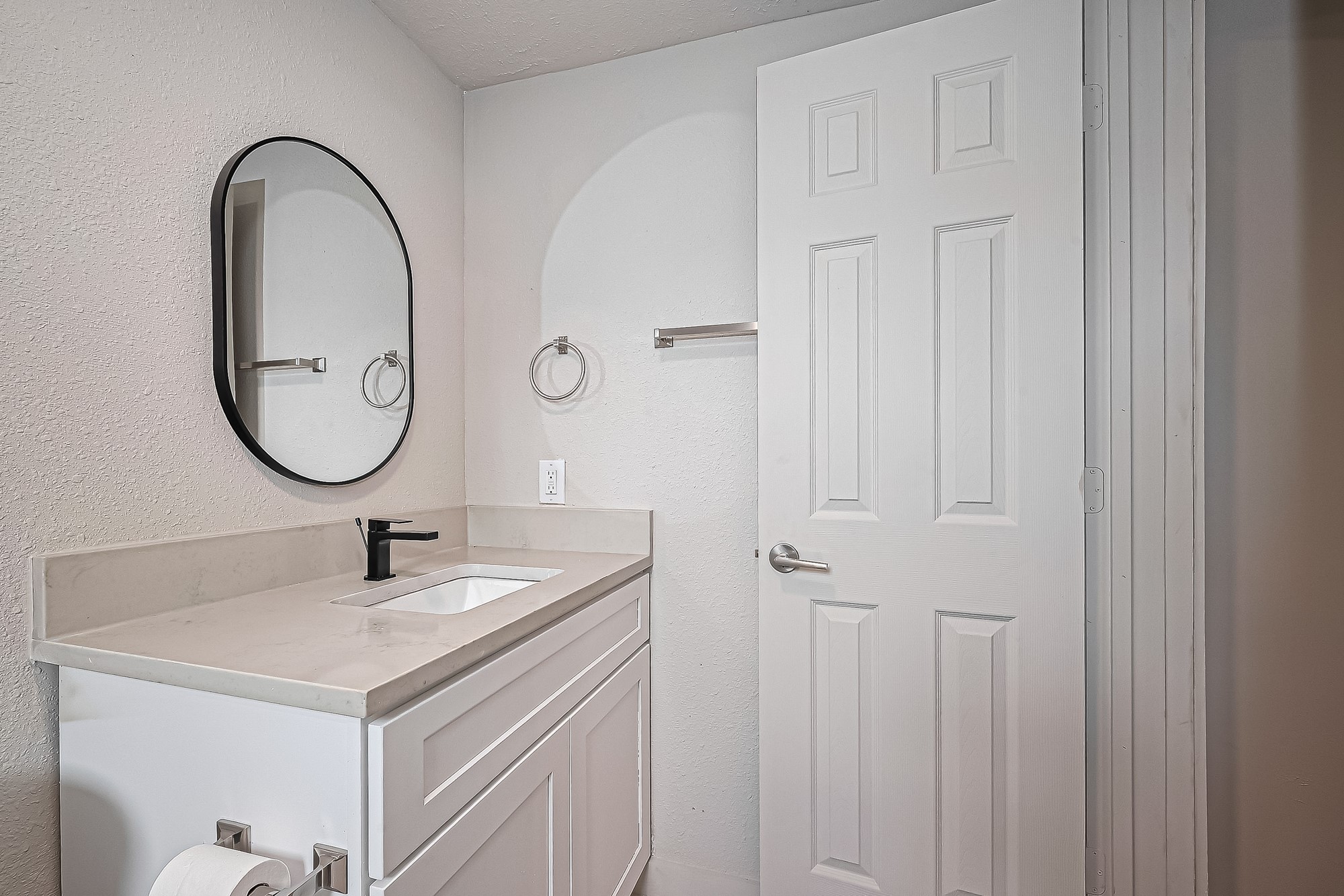 4013 Ranch Street, Unit 1 Houston, TX 77026 - Photo 11 of 16 a bathroom with a sink and a mirror