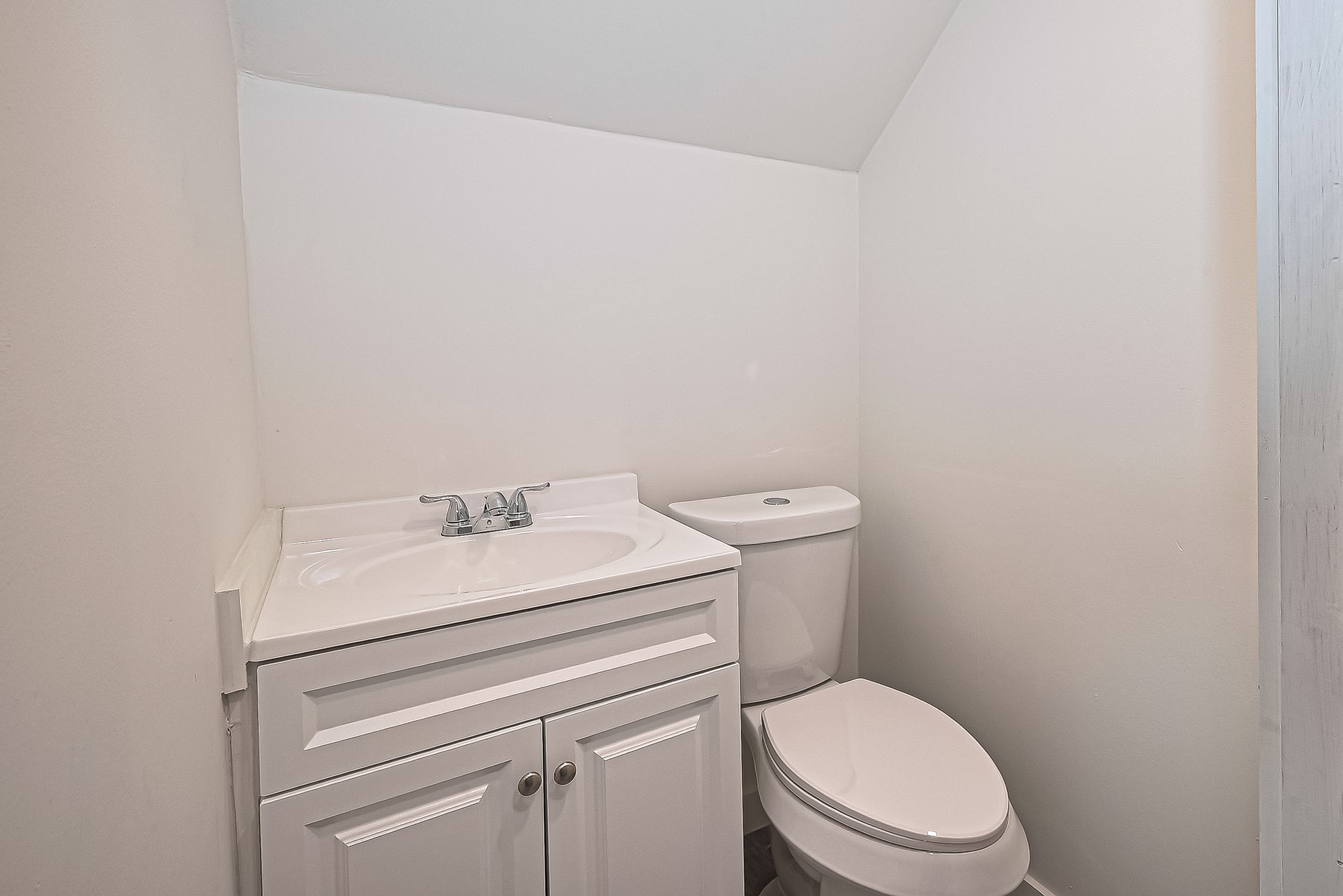 4013 Ranch Street, Unit 1 Houston, TX 77026 - Photo 5 of 16 a white toilet sitting next to a white sink