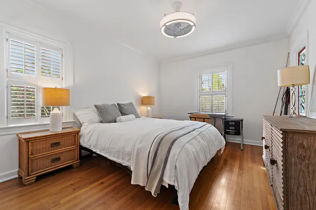 a bed room with a bed and a tv