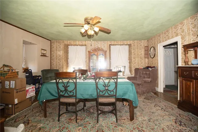a kitchen with a stove a sink and a refrigerator