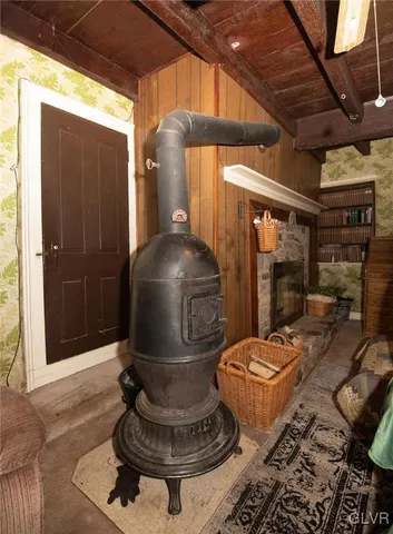 a living room with couch and a flat screen tv