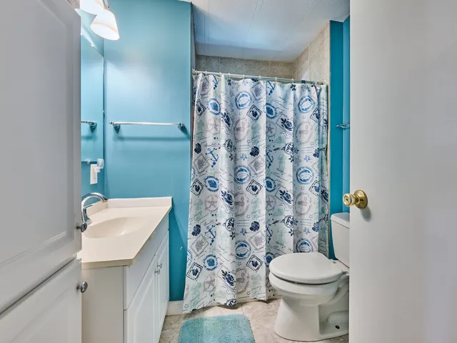 a view of swimming pool with seating area