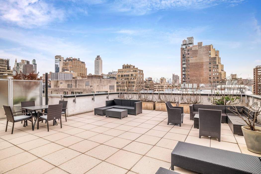 261 West 28th Street, Unit 9C Manhattan, NY 10001 - Photo 10 of 12 a view of a terrace with chairs