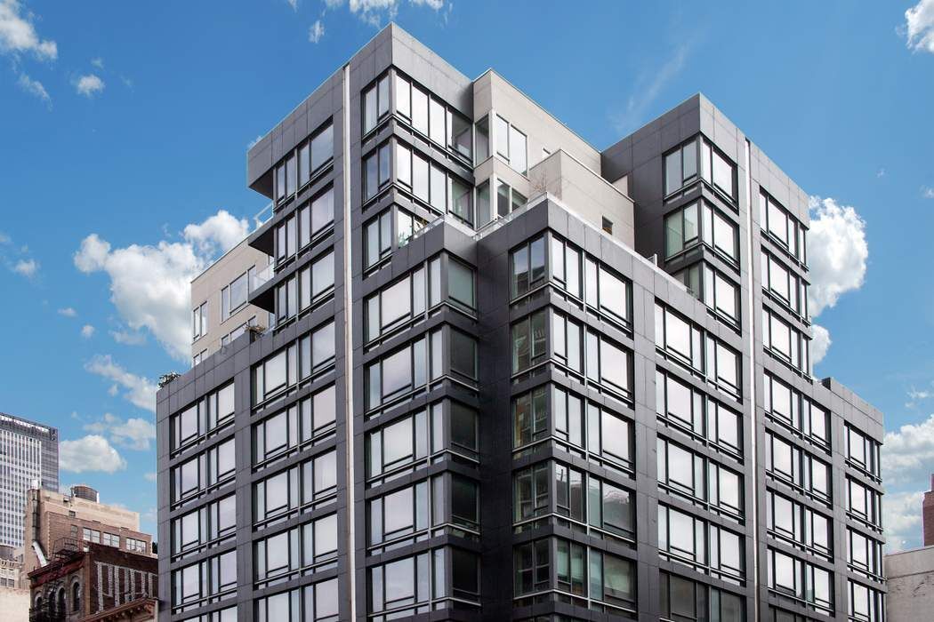 261 West 28th Street, Unit 9C Manhattan, NY 10001 - Photo 11 of 12 front view of a building