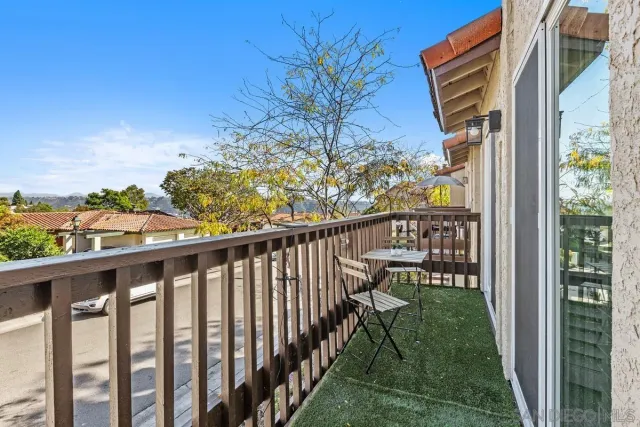 a view of a porch with a bench