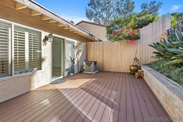 a view of a storage & utility room with a washer dryer