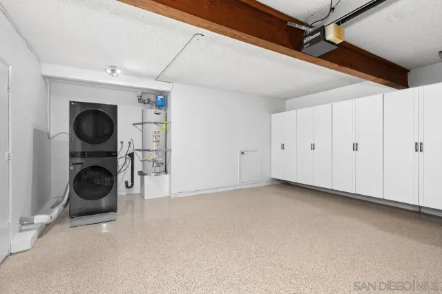 a view of staircase with white walls