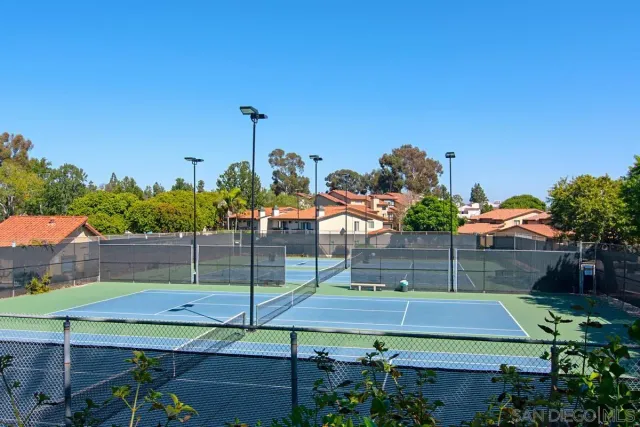 a view of swimming pool with seating space