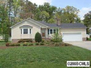5532 Randolph Road Kannapolis, NC 28081 - Photo 1 of 3 a house with green field in front of it