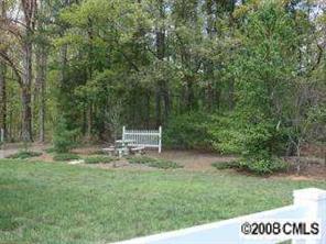 5532 Randolph Road Kannapolis, NC 28081 - Photo 2 of 3 a view of a park with a bench in a park