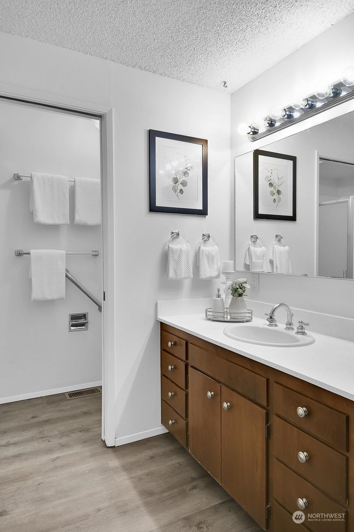 318 170th Place Southwest Bothell, WA 98012 - Photo 17 of 34 a bathroom with a double vanity sink and mirror