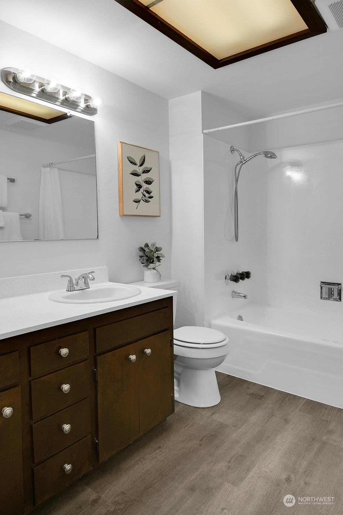 318 170th Place Southwest Bothell, WA 98012 - Photo 19 of 34 a bathroom with a double vanity sink toilet and shower
