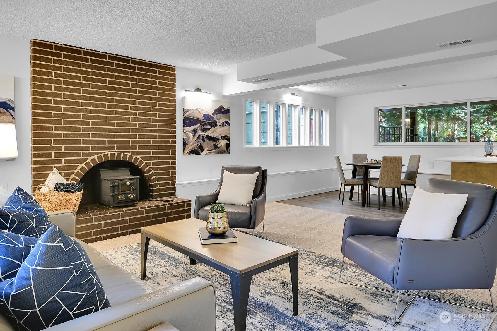 318 170th Place Southwest Bothell, WA 98012 - Photo 22 of 34 a living room with furniture and a fireplace