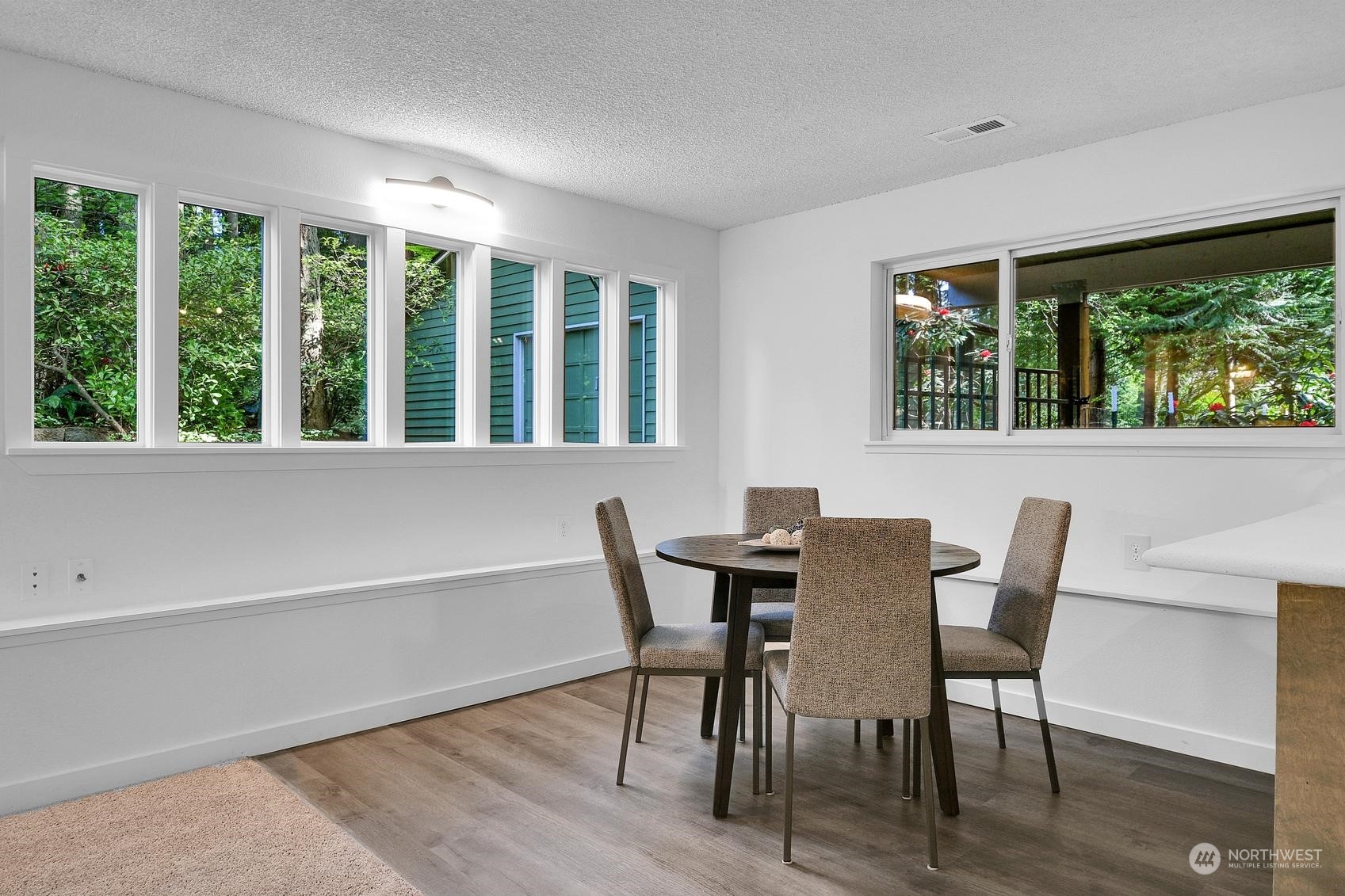 318 170th Place Southwest Bothell, WA 98012 - Photo 23 of 34 a view of a dining room with furniture window and outside view