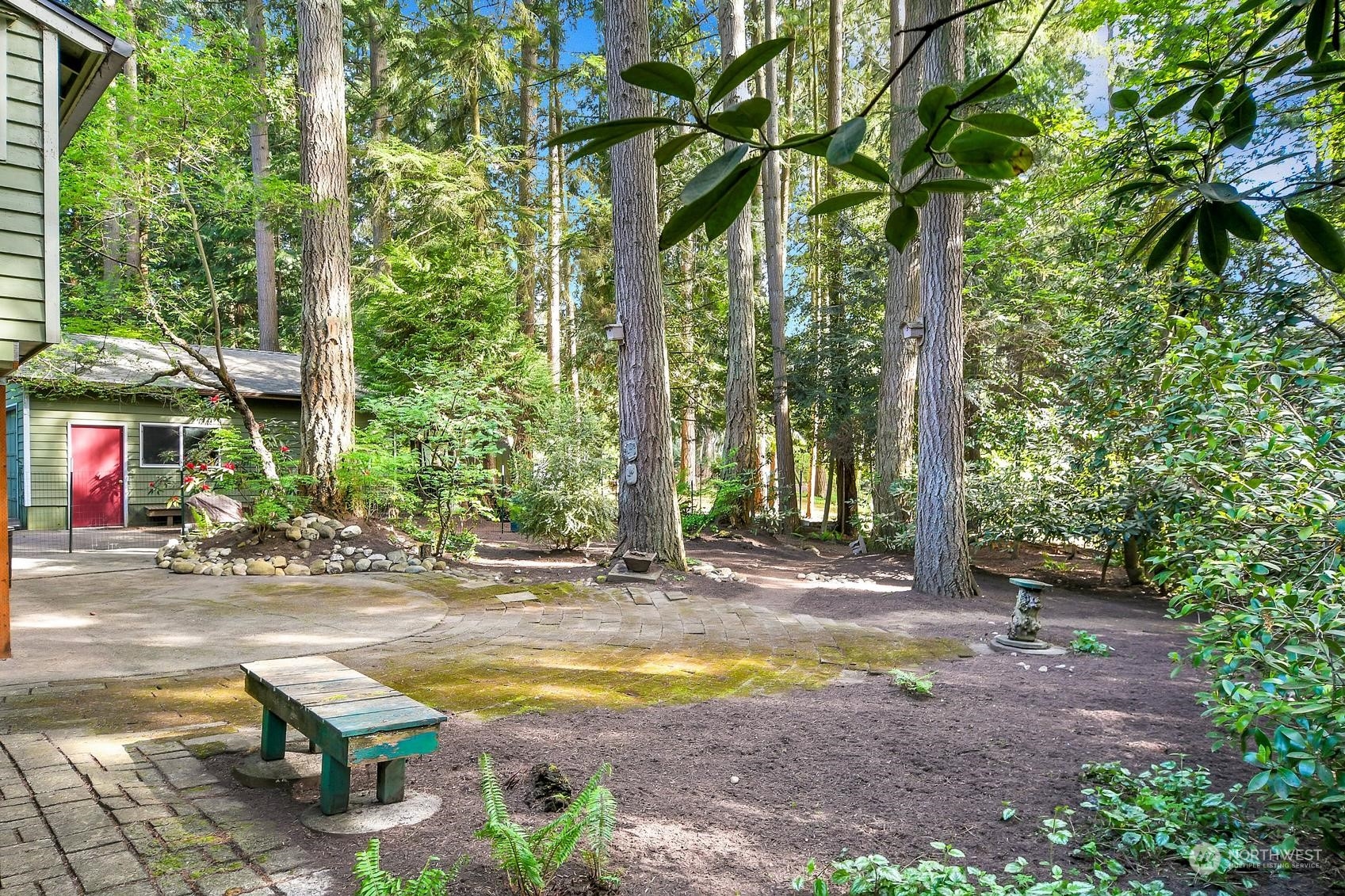 318 170th Place Southwest Bothell, WA 98012 - Photo 31 of 34 a view of backyard with plants and trees