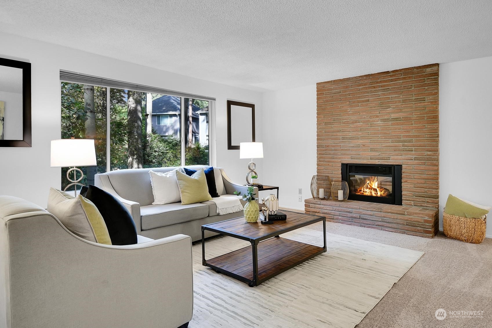 318 170th Place Southwest Bothell, WA 98012 - Photo 4 of 34 a living room with furniture and a fireplace