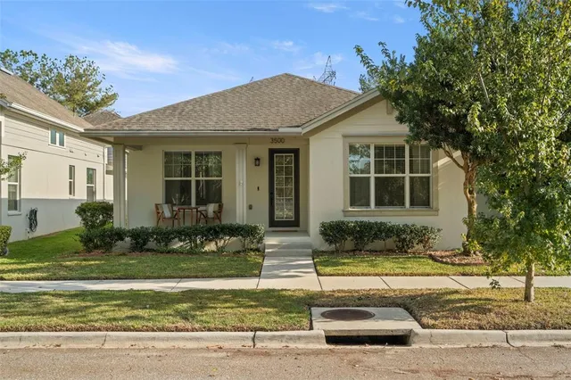 a kitchen with granite countertop kitchen island a sink appliances and cabinets