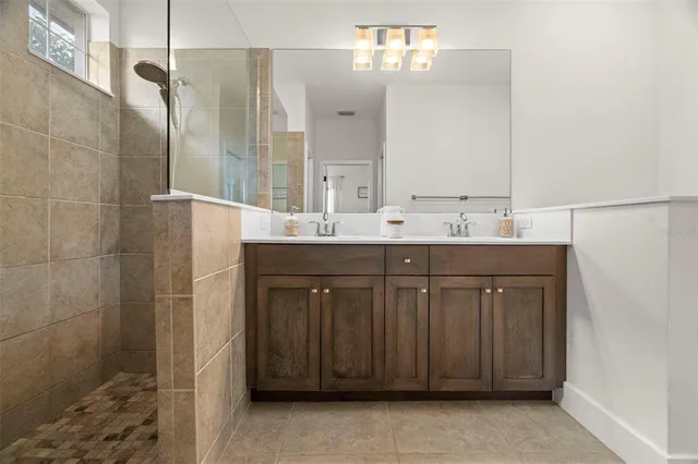 a view of storage and utility room with washer and dryer
