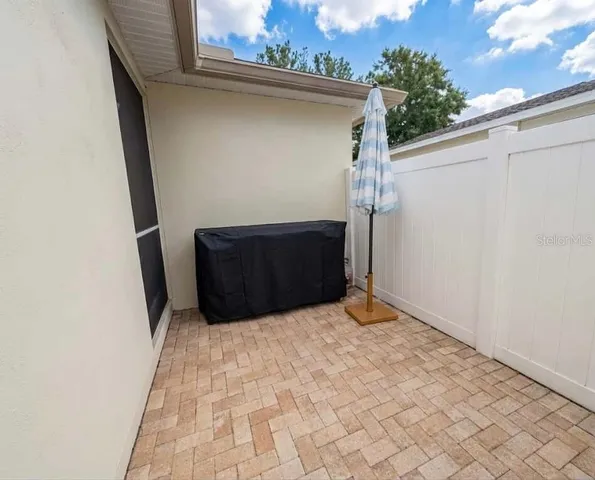 an aerial view of a house with lake view