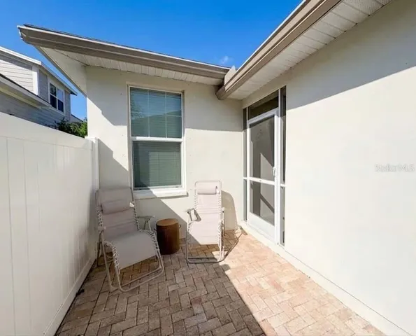 an aerial view of house with yard