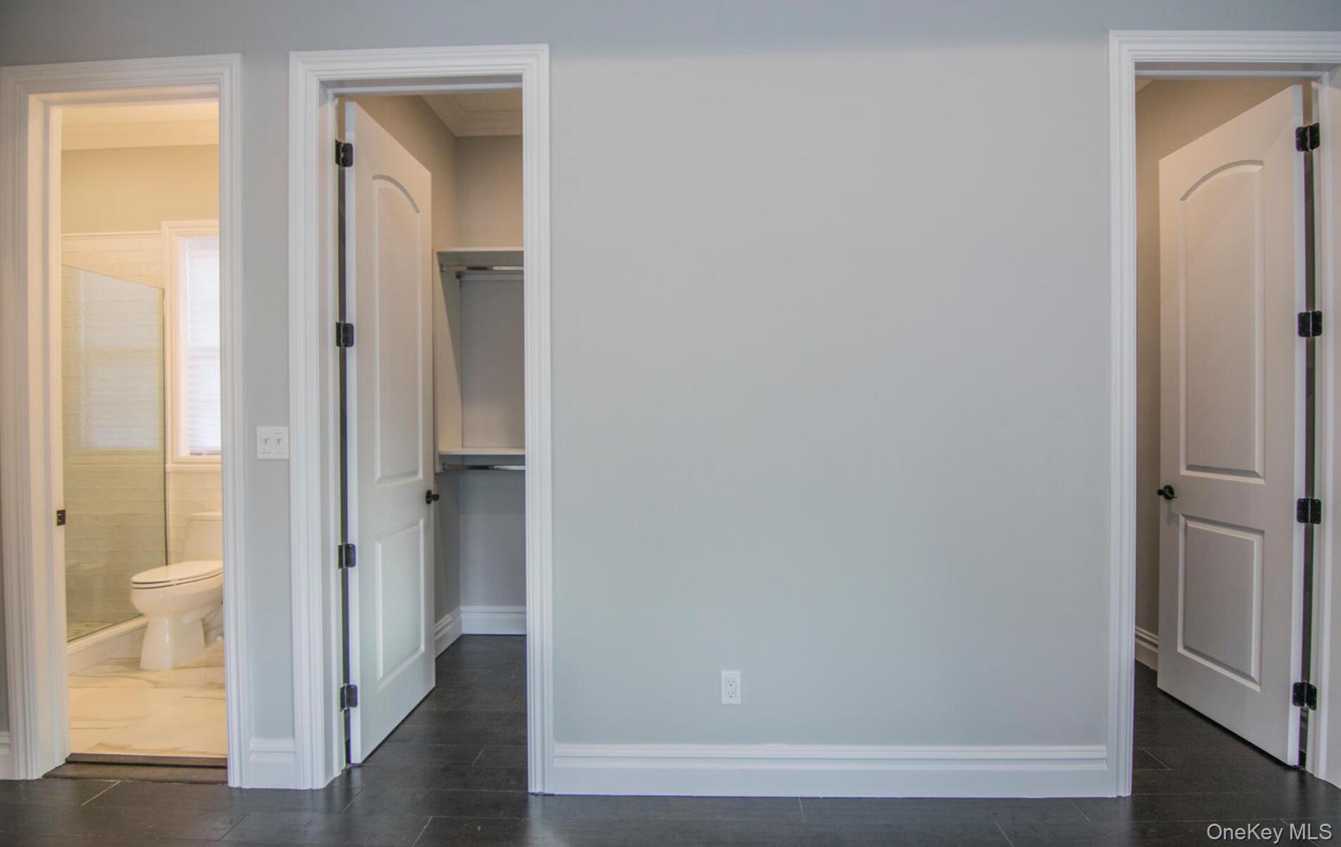 2 Seaman Road Glen Cove, NY 11542 - Photo 12 of 17 Primary Custom walk-in closets with lighting.