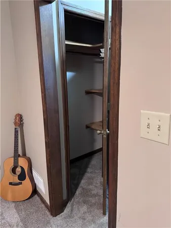 a view of a bathroom from a hallway