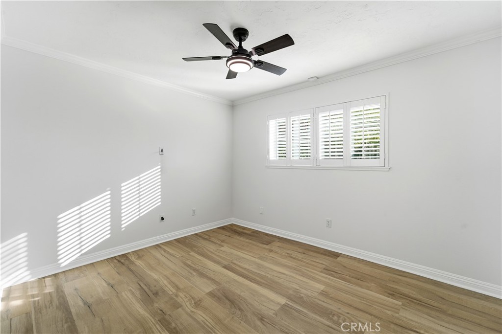 11344 Baird Avenue Porter Ranch, CA 91326 - Photo 19 of 45 wooden floor in an empty room with a window