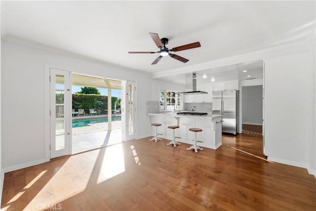 11344 Baird Avenue Porter Ranch, CA 91326 - Photo 2 of 45 a living room with stainless steel appliances furniture cabinets and a rug