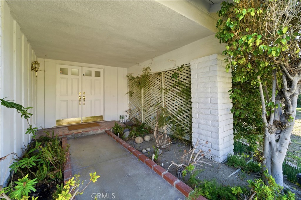 11344 Baird Avenue Porter Ranch, CA 91326 - Photo 41 of 45 a view of a house with a backyard and a garden