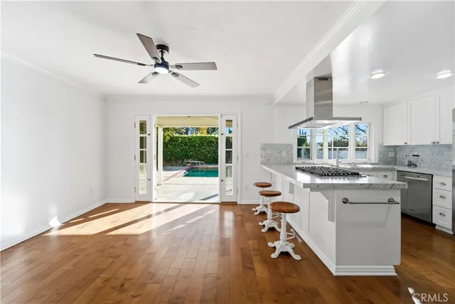 a very nice looking kitchen with a large window