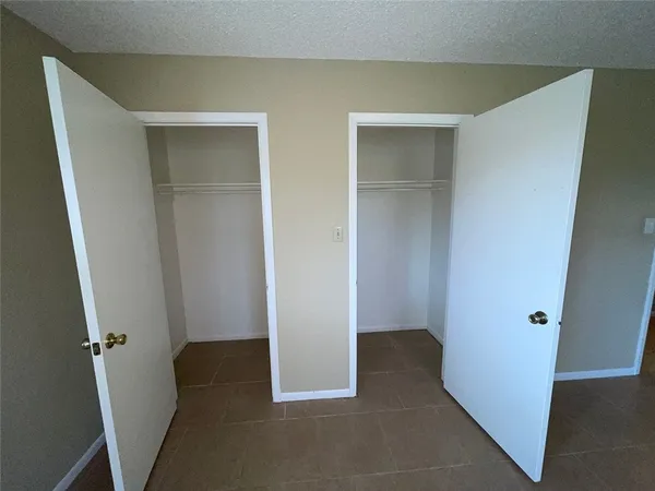 a bathroom with a toilet and a bathtub